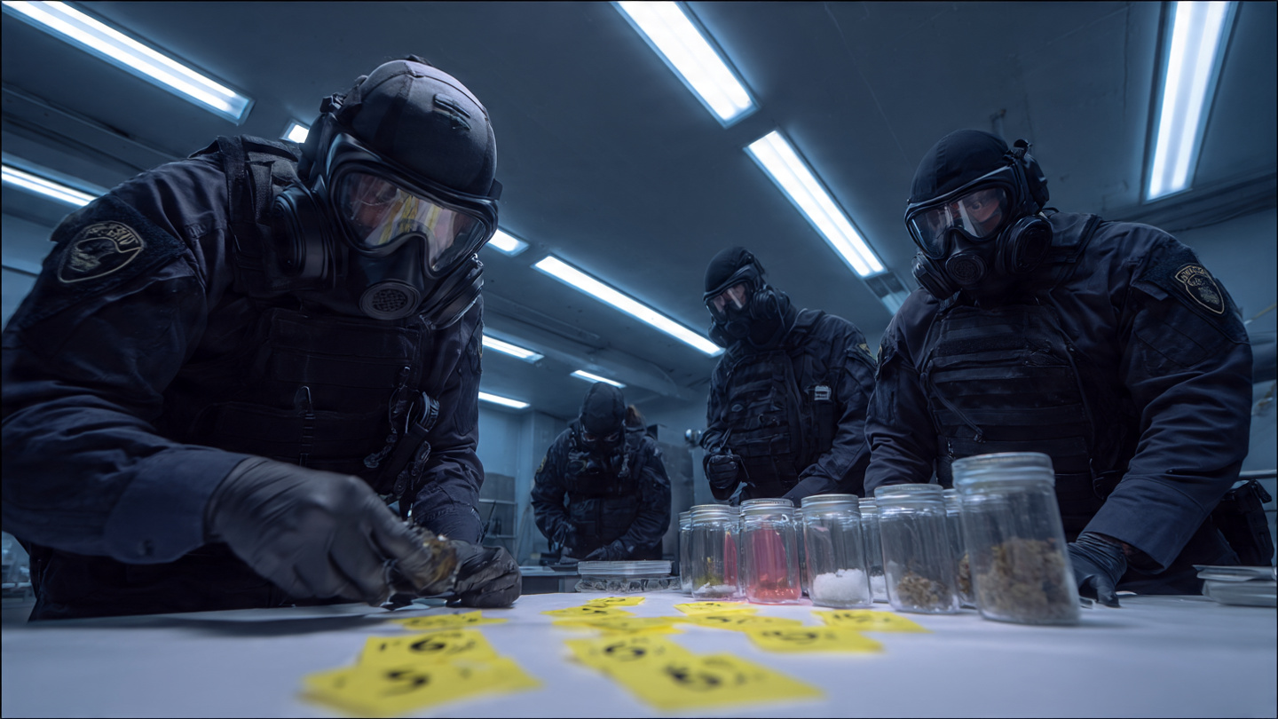 ATF agents in tactical gear and evidence gloves surrounding a large bombardier beetle on a laboratory evidence table, examining its abdomen with magnifying instruments under harsh fluorescent lighting, yellow evidence markers numbered beside chemical residue samples